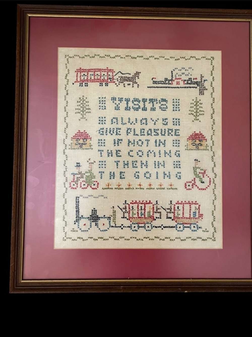 Framed vintage cross stitch from early 1970's, excellent condition.